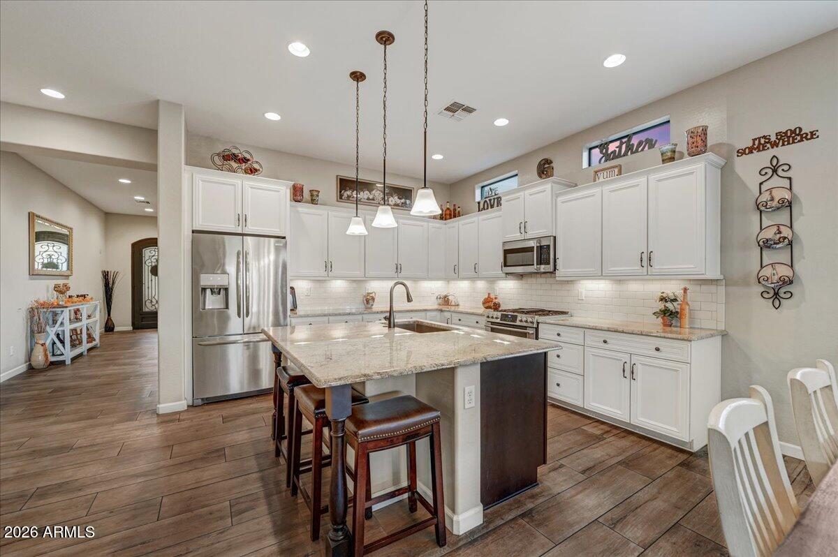 9155 E LEONORA Street