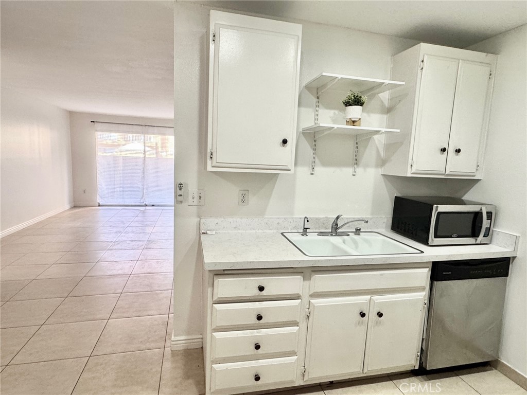 6600 Warner Avenue 115