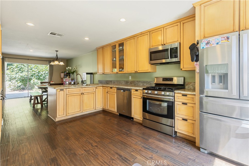 12203 Santa Gertrudes Ave