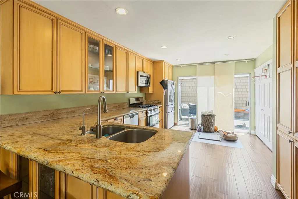 12203 Santa Gertrudes Ave