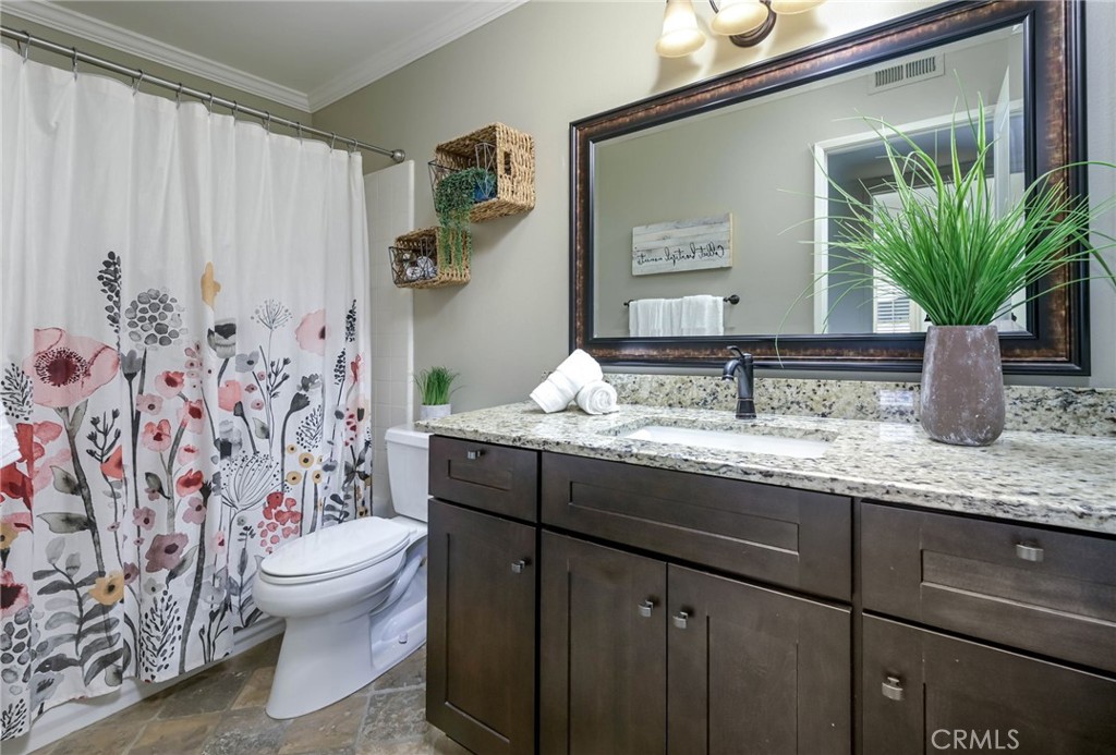 6587 E VIA ARBOLES