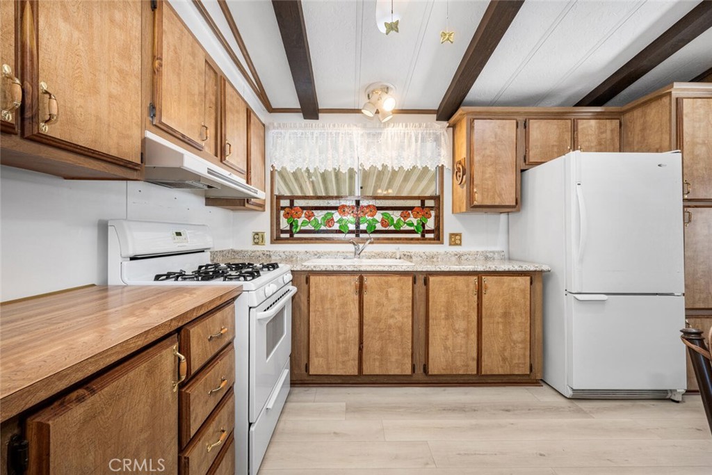 6248 GOLDEN SANDS Drive E 215