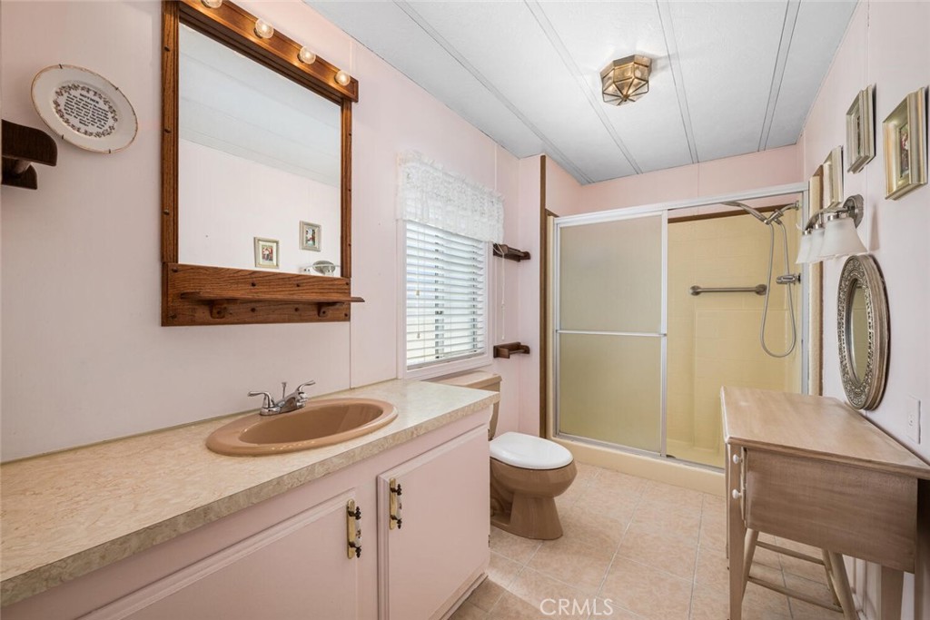 6248 GOLDEN SANDS Drive E 215