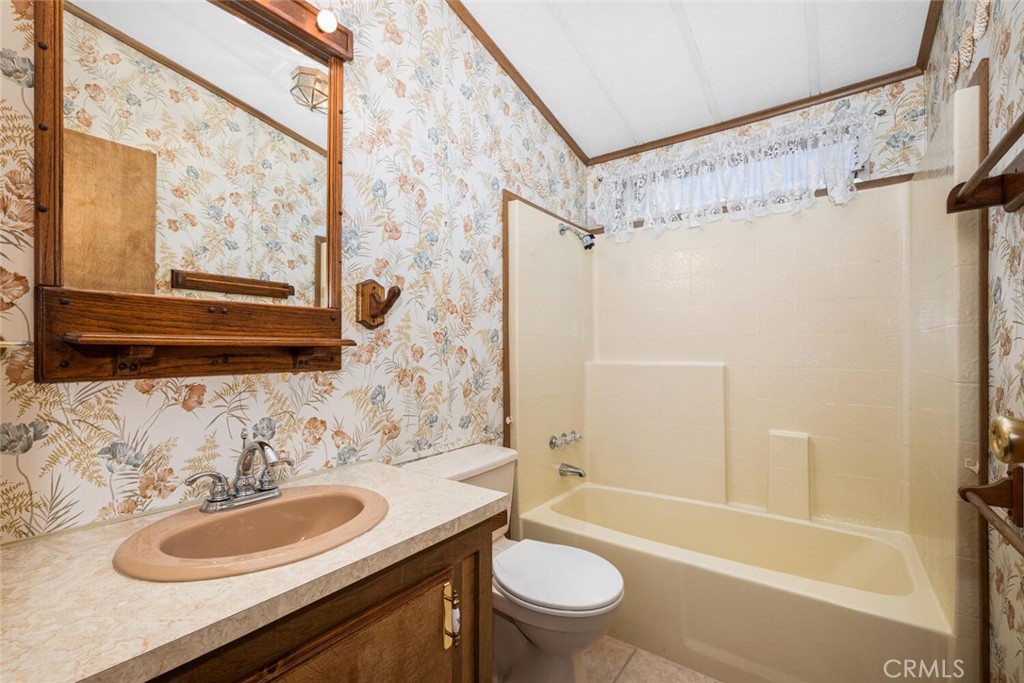 6248 GOLDEN SANDS Drive E 215