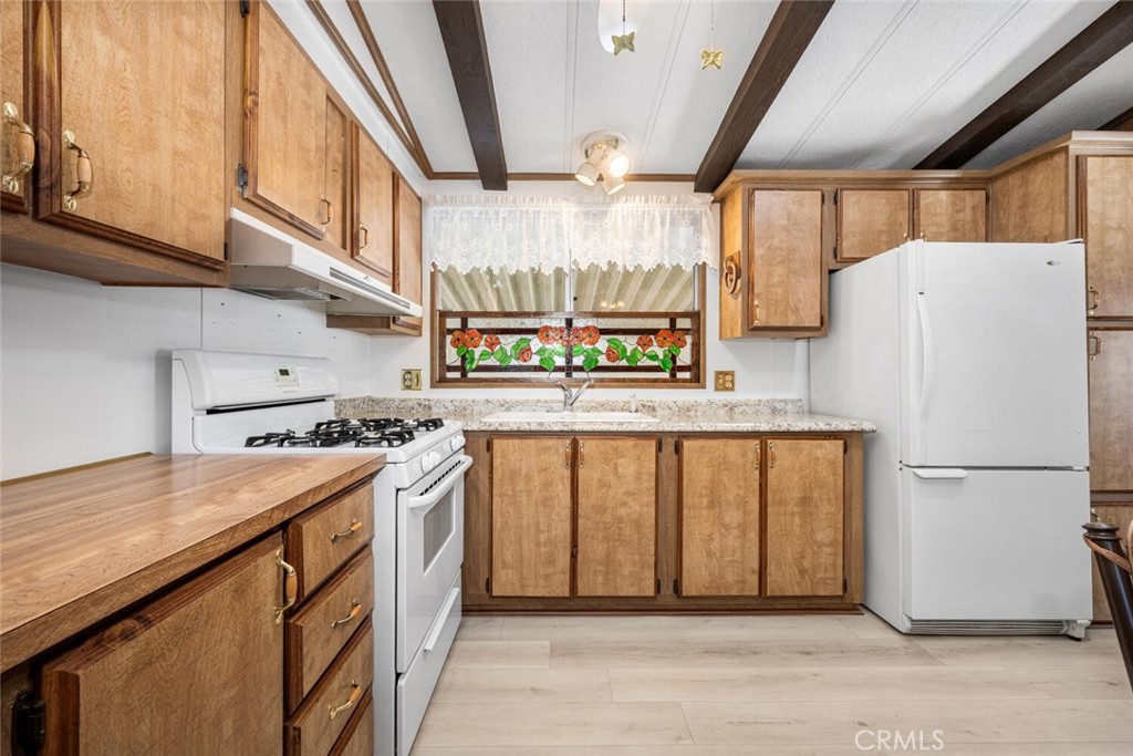 6248 GOLDEN SANDS Drive E 215