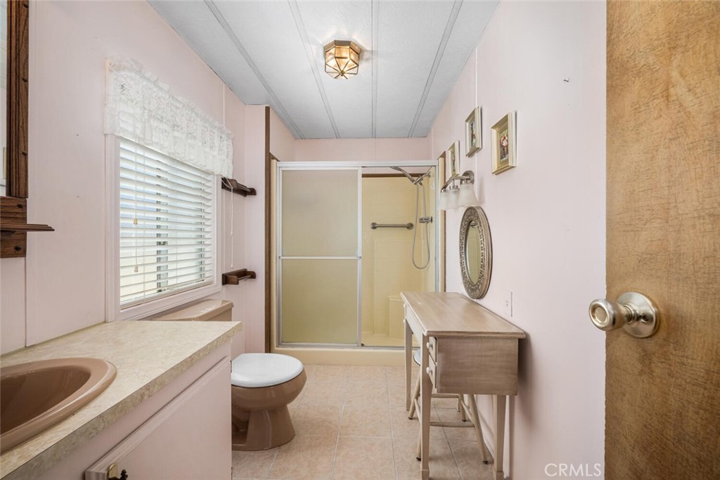 6248 GOLDEN SANDS Drive E 215