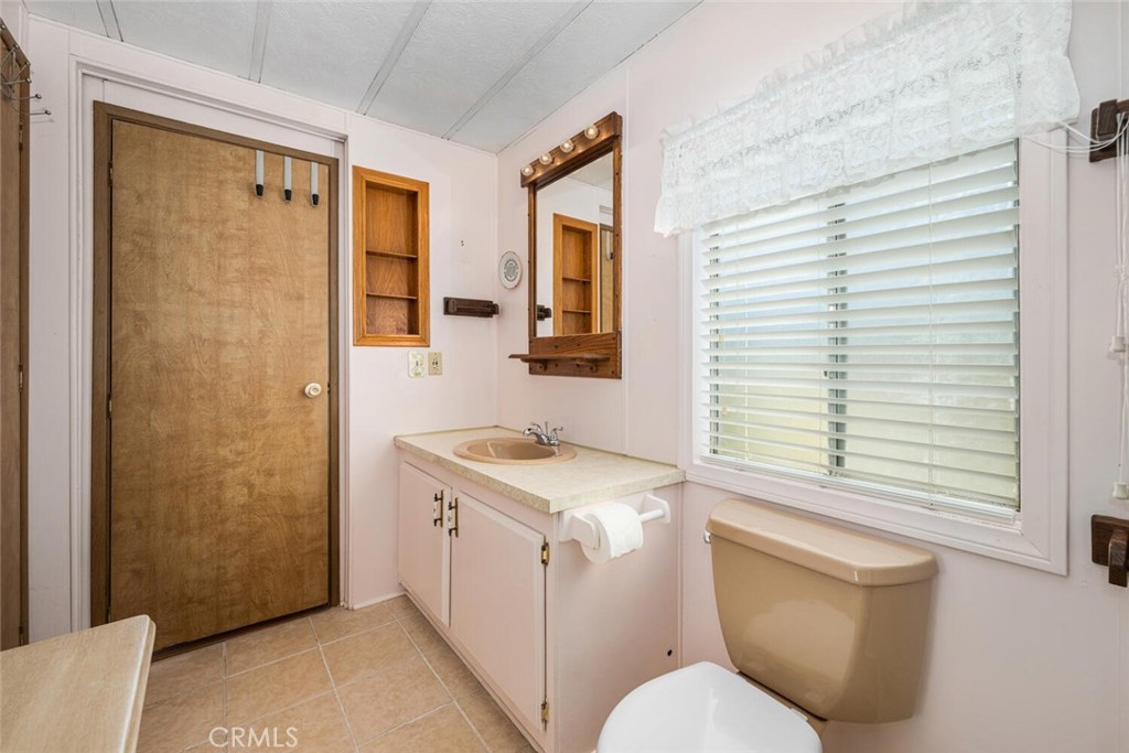 6248 GOLDEN SANDS Drive E 215