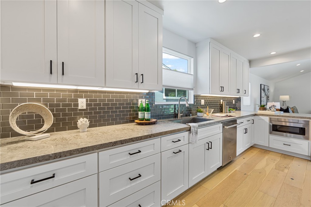 6841 E Septimo Street