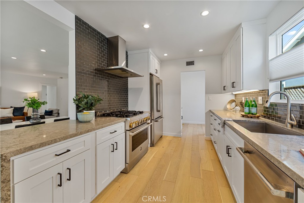 6841 E Septimo Street