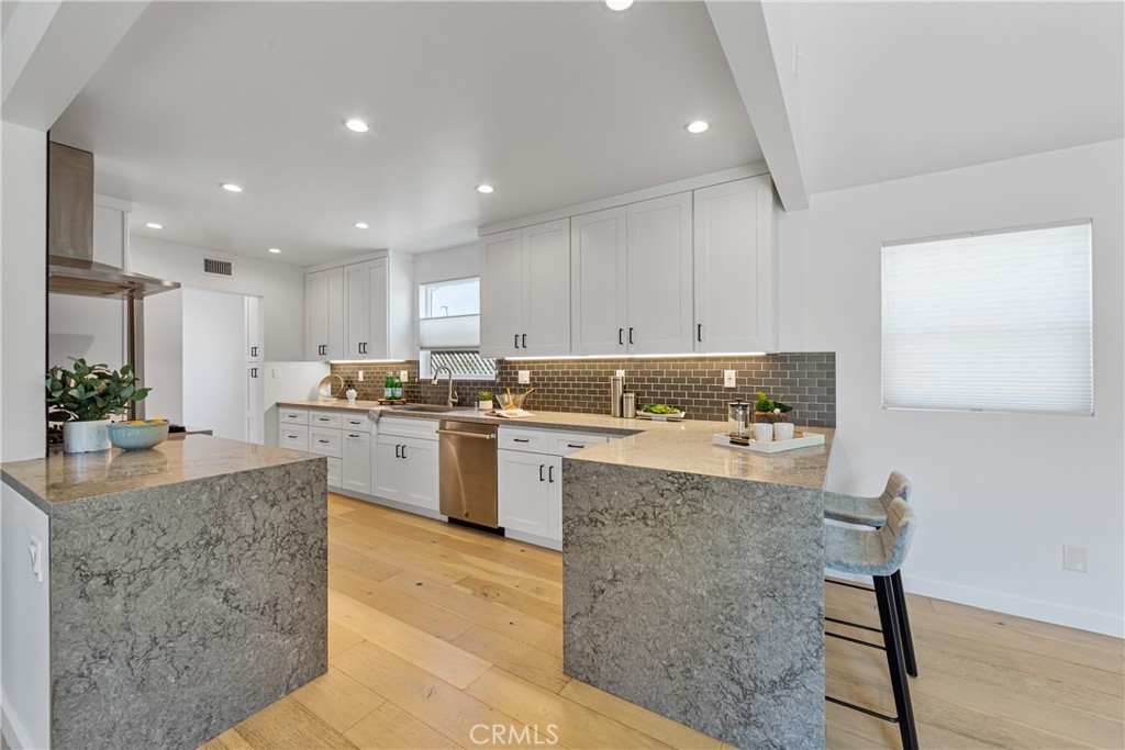 6841 E Septimo Street