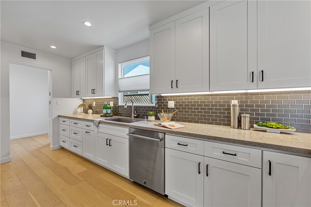 6841 E Septimo Street