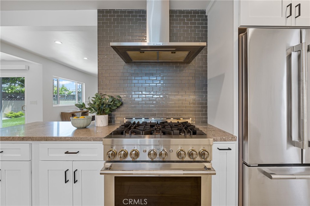 6841 E Septimo Street