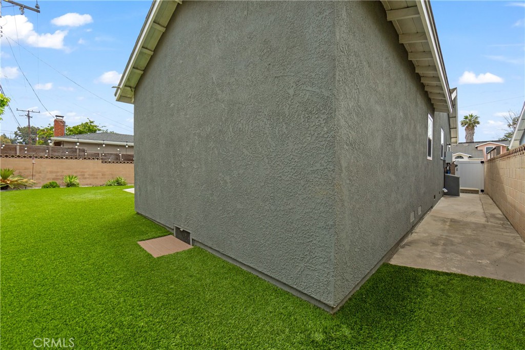 6841 E Septimo Street