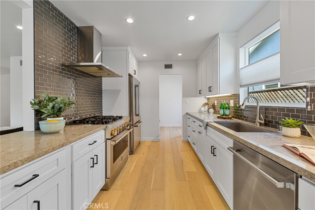 6841 E Septimo Street