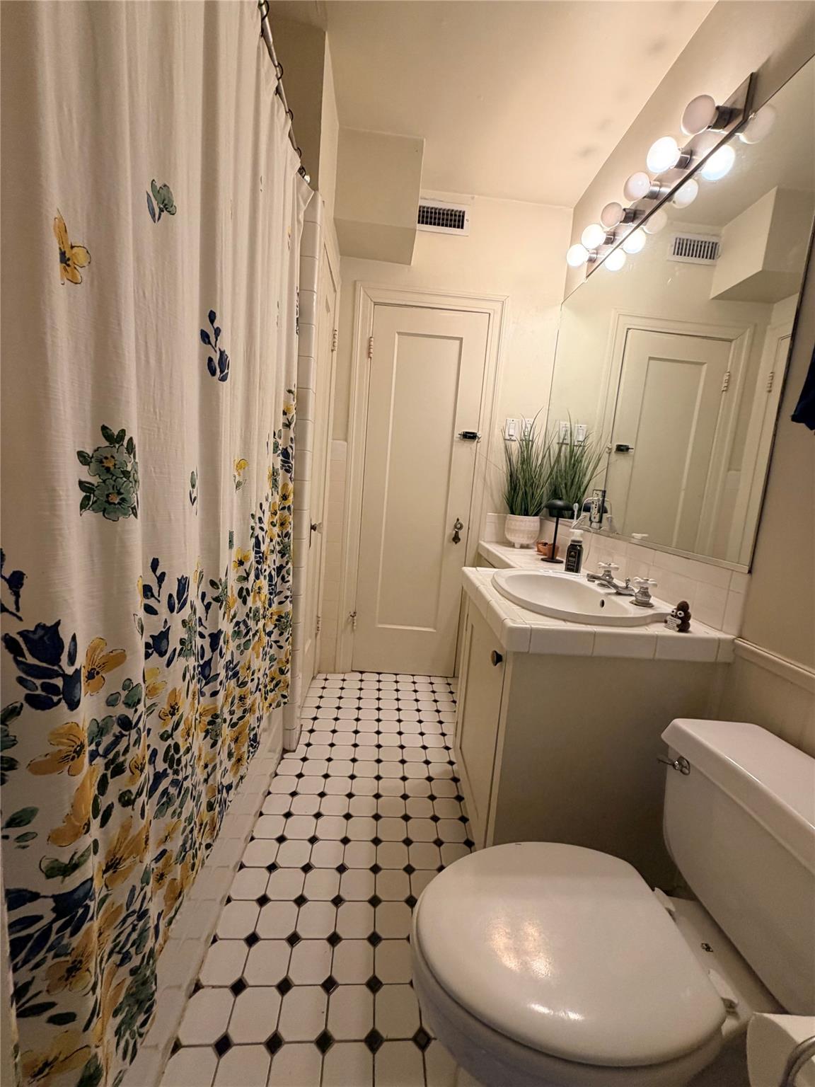 102-A W 32nd ST