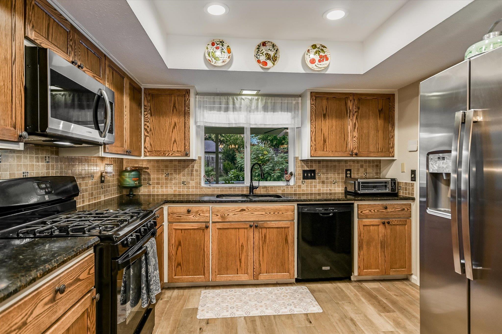10909 Rustic Manor LN
