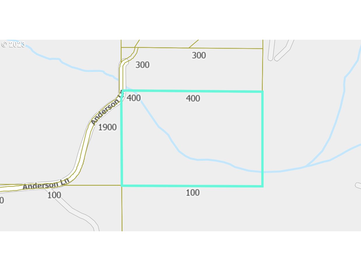 Map outlining a property along Anderson Ln, with a creek running through it.