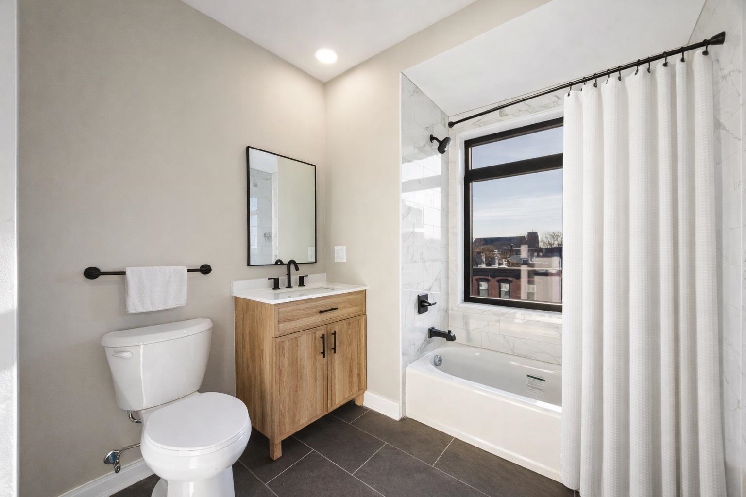 558 COMMUNIPAW AVE Unit: 203