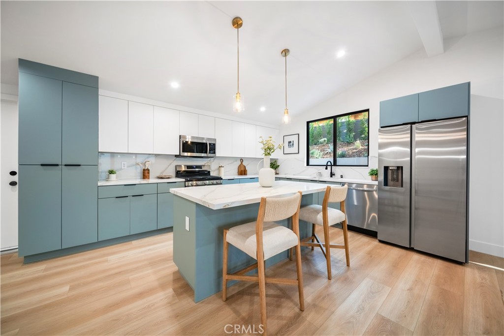 5623, 5625, 5627 Oso Ave