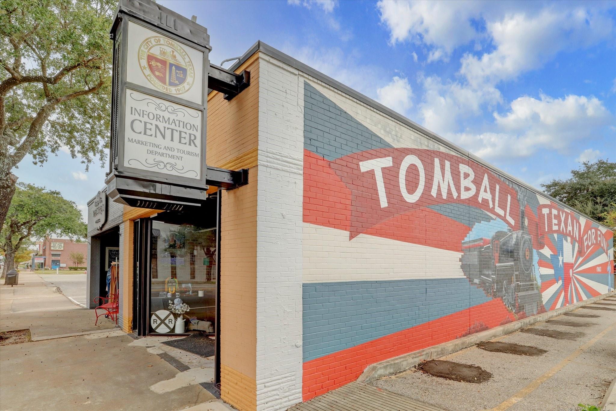 Tomball information center with a large red, white, and blue Texas mural.