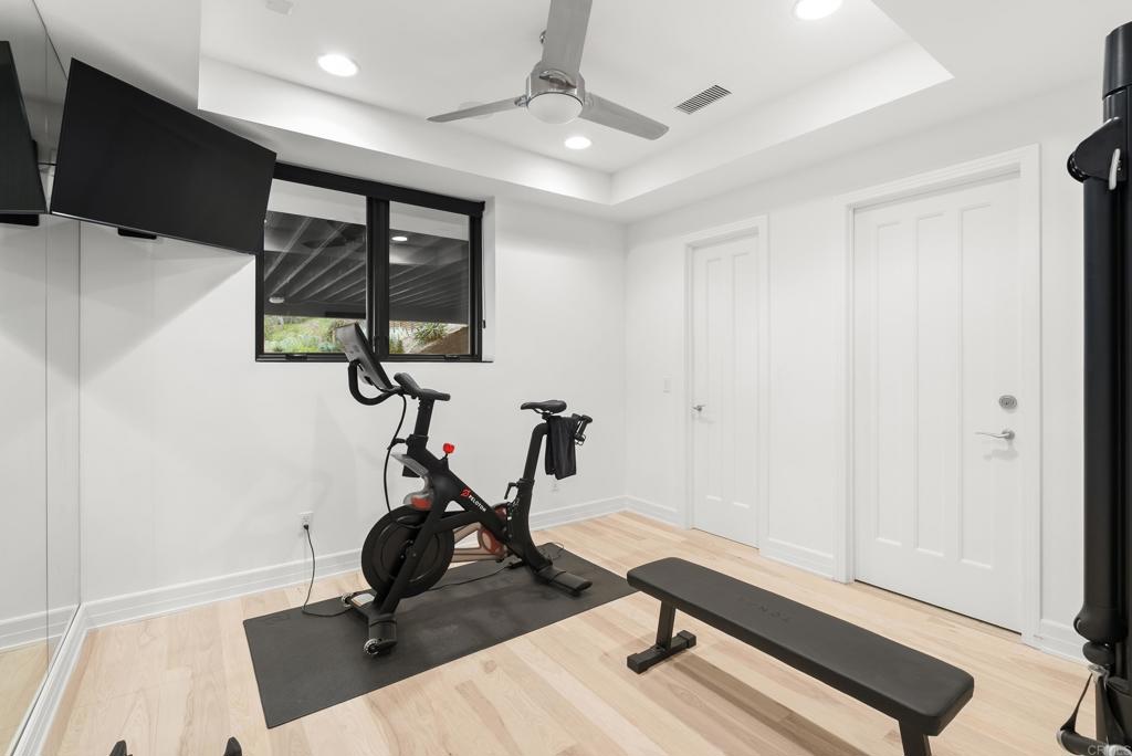 Modern Fitness Room With Equipment