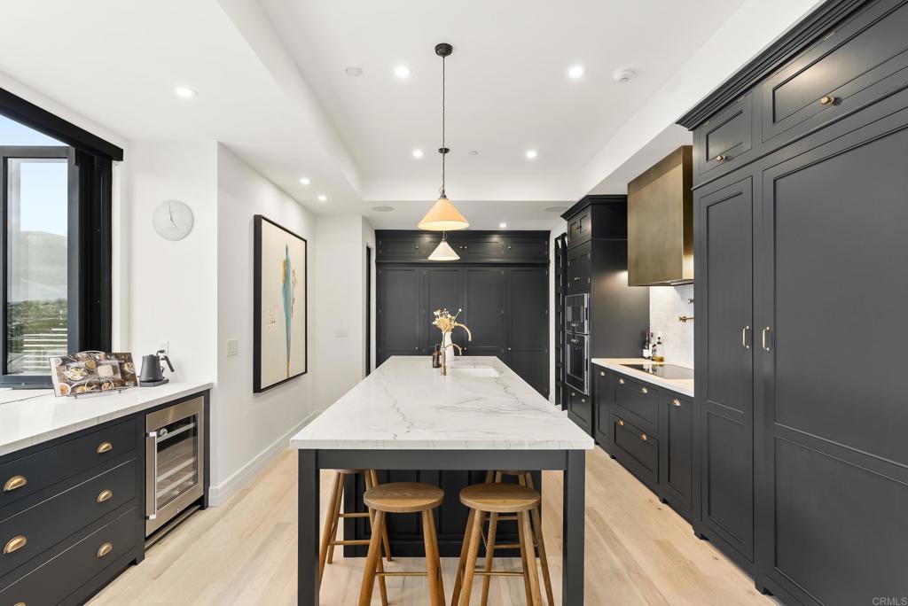 Open Gourmet Kitchen With Cabinets