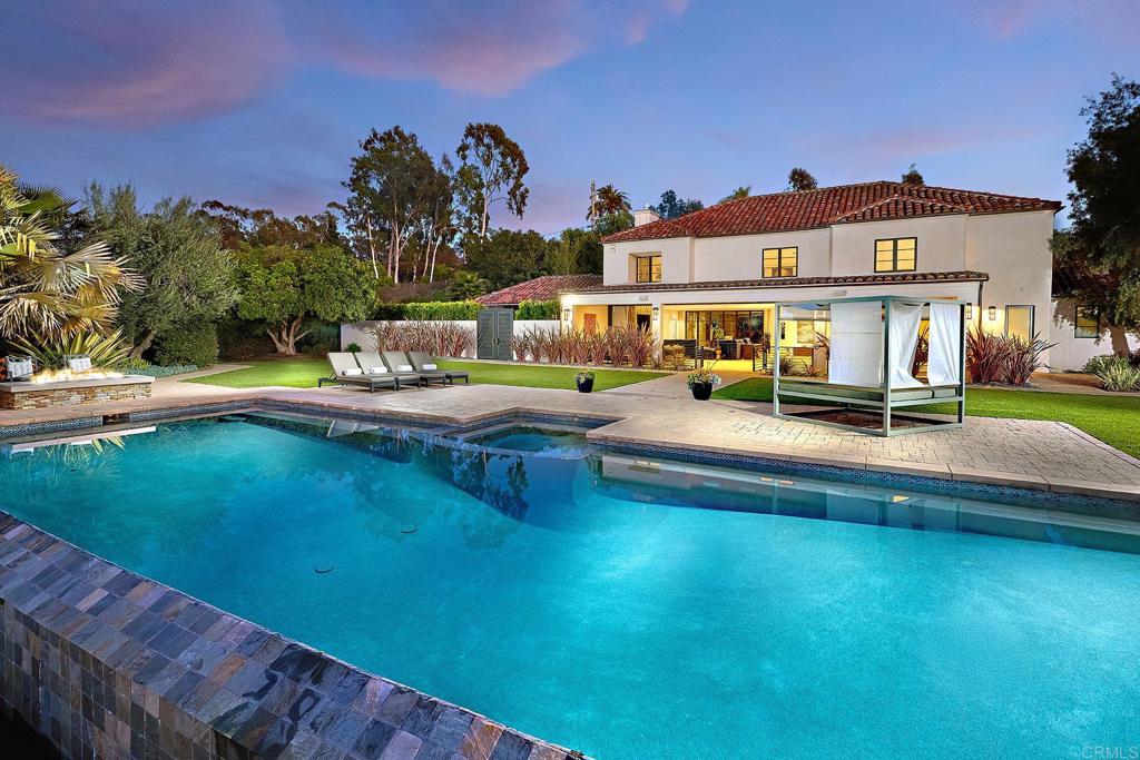 Twilight Pool And Home Exterior