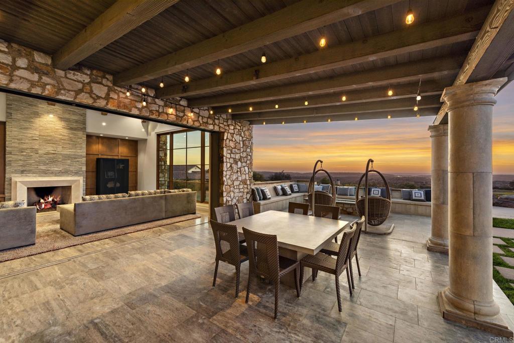 Outdoor dining and BBQ pavilion at luxury Santaluz estate