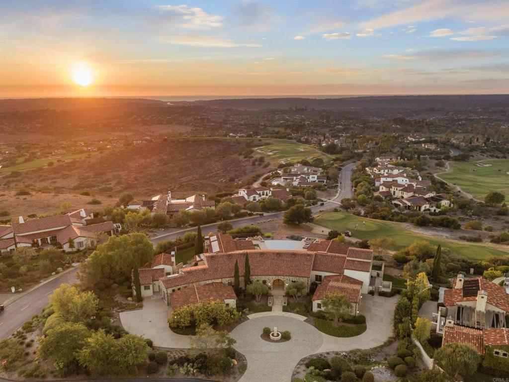 Aerial view of Santaluz luxury estate surrounded by rolling hills