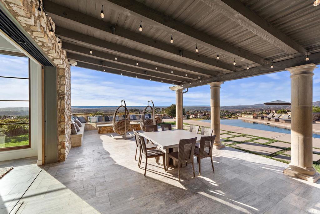 Outdoor dining patio with golf course views