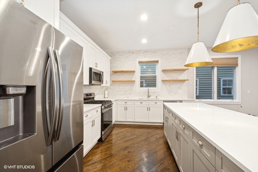 1015 N PAULINA Street Unit: 1