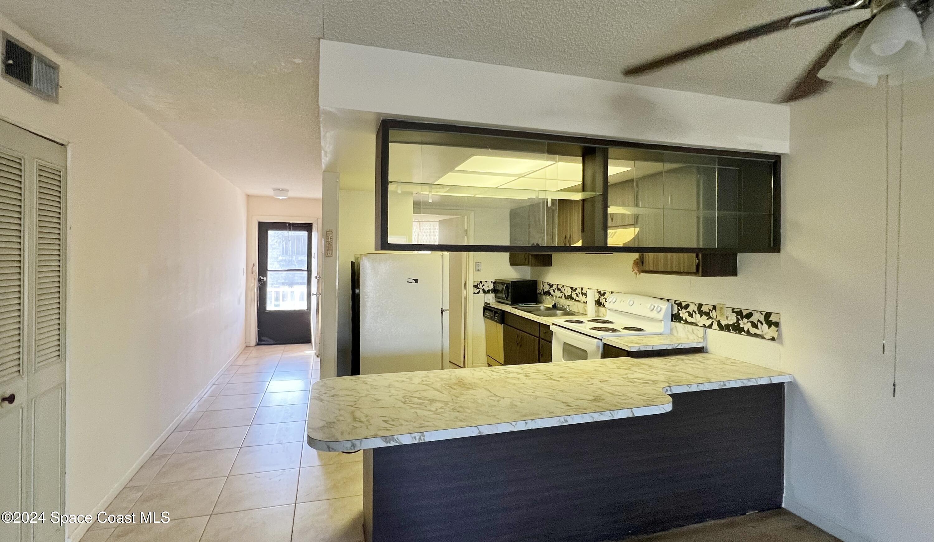 2135 N Courtenay Parkway 202