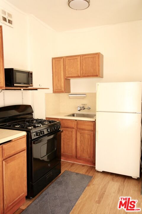 2121 James M Wood Blvd Unit: 310