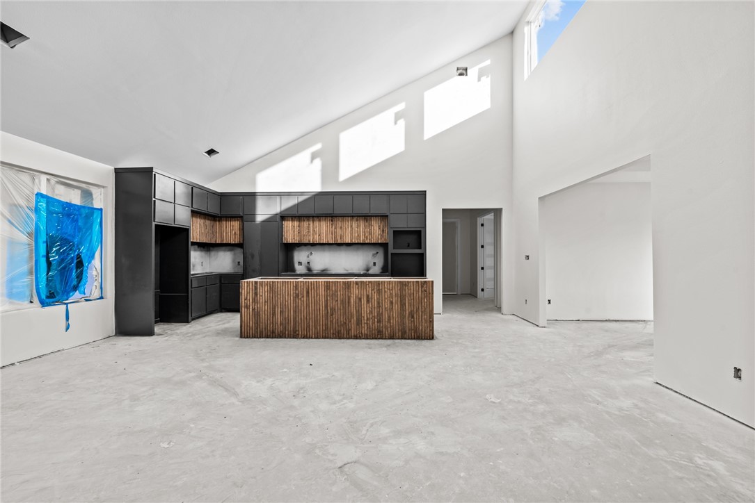 Open-concept great room and kitchen at 1494 Irigoyen designed for everyday living and entertaining