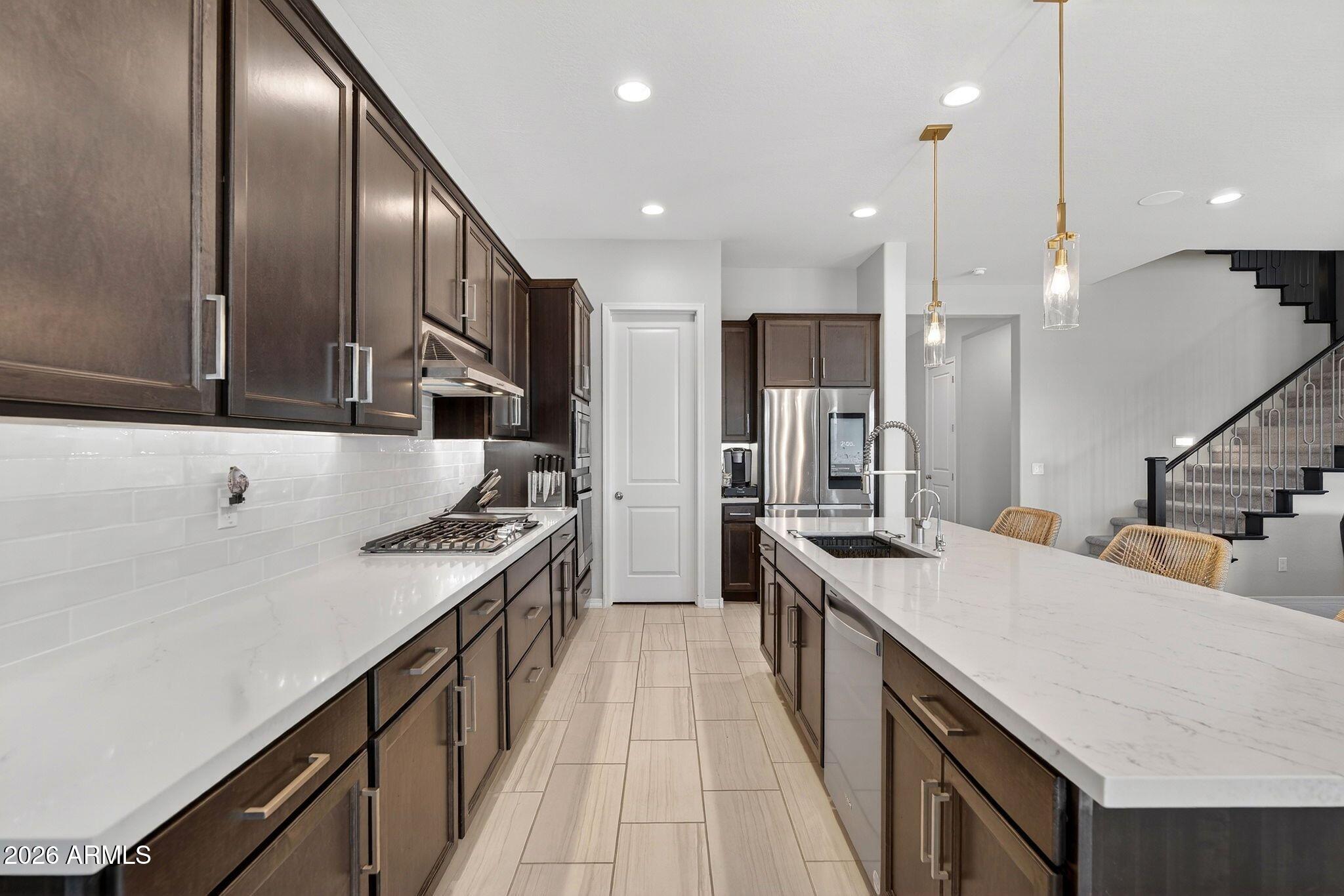 11541 E UTOPIA Avenue