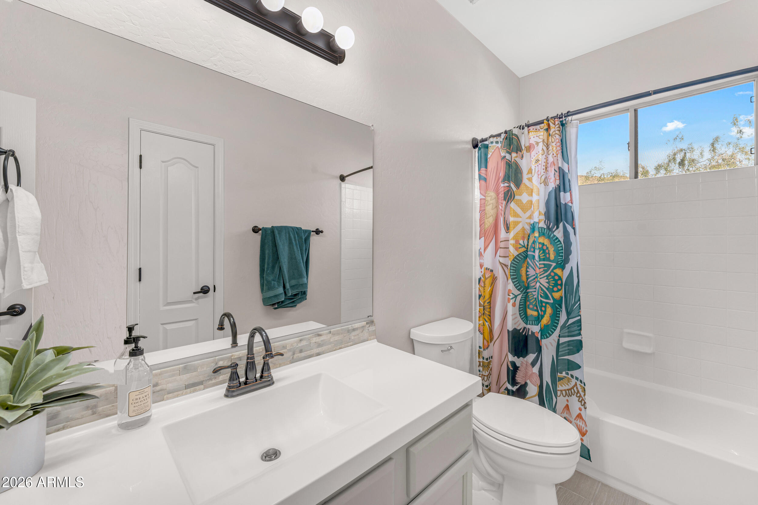 8148 E SIENNA Street