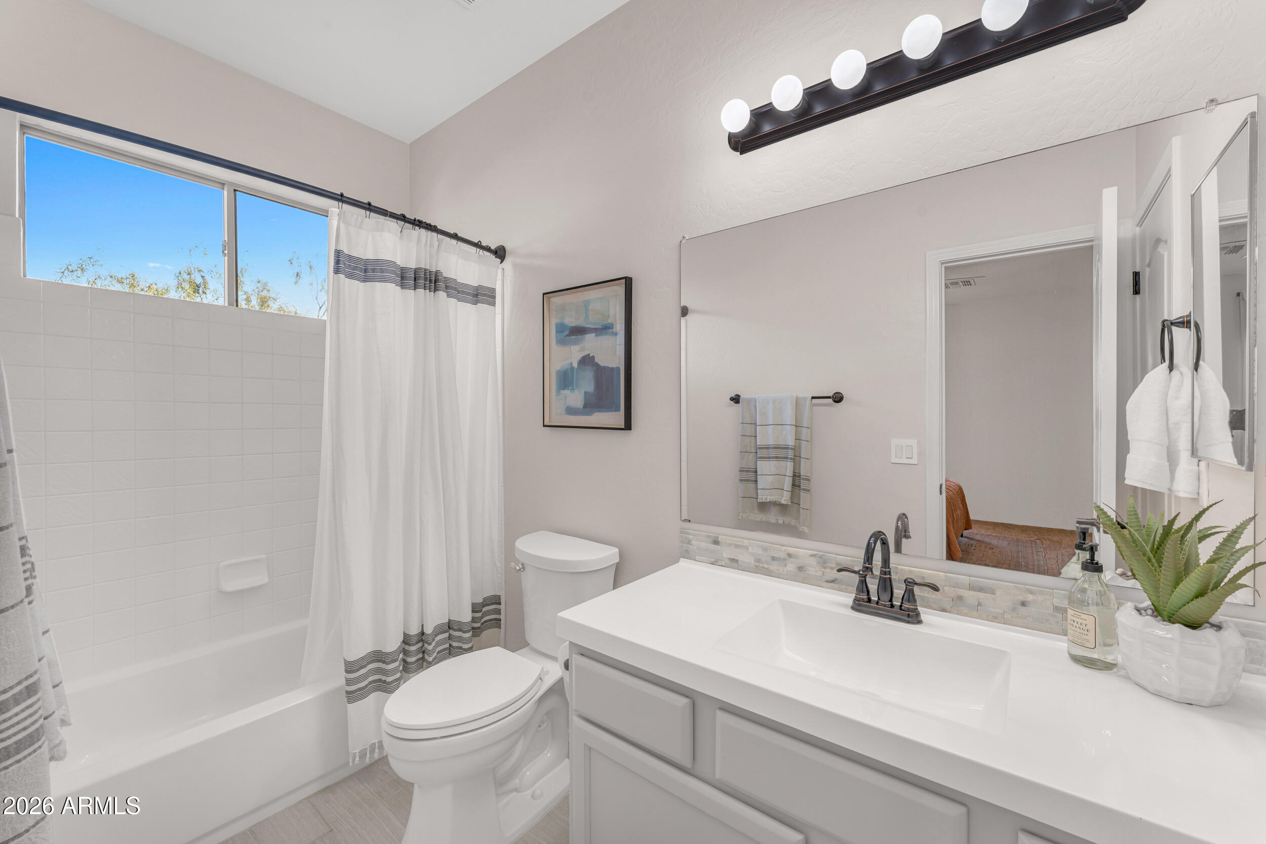 8148 E SIENNA Street