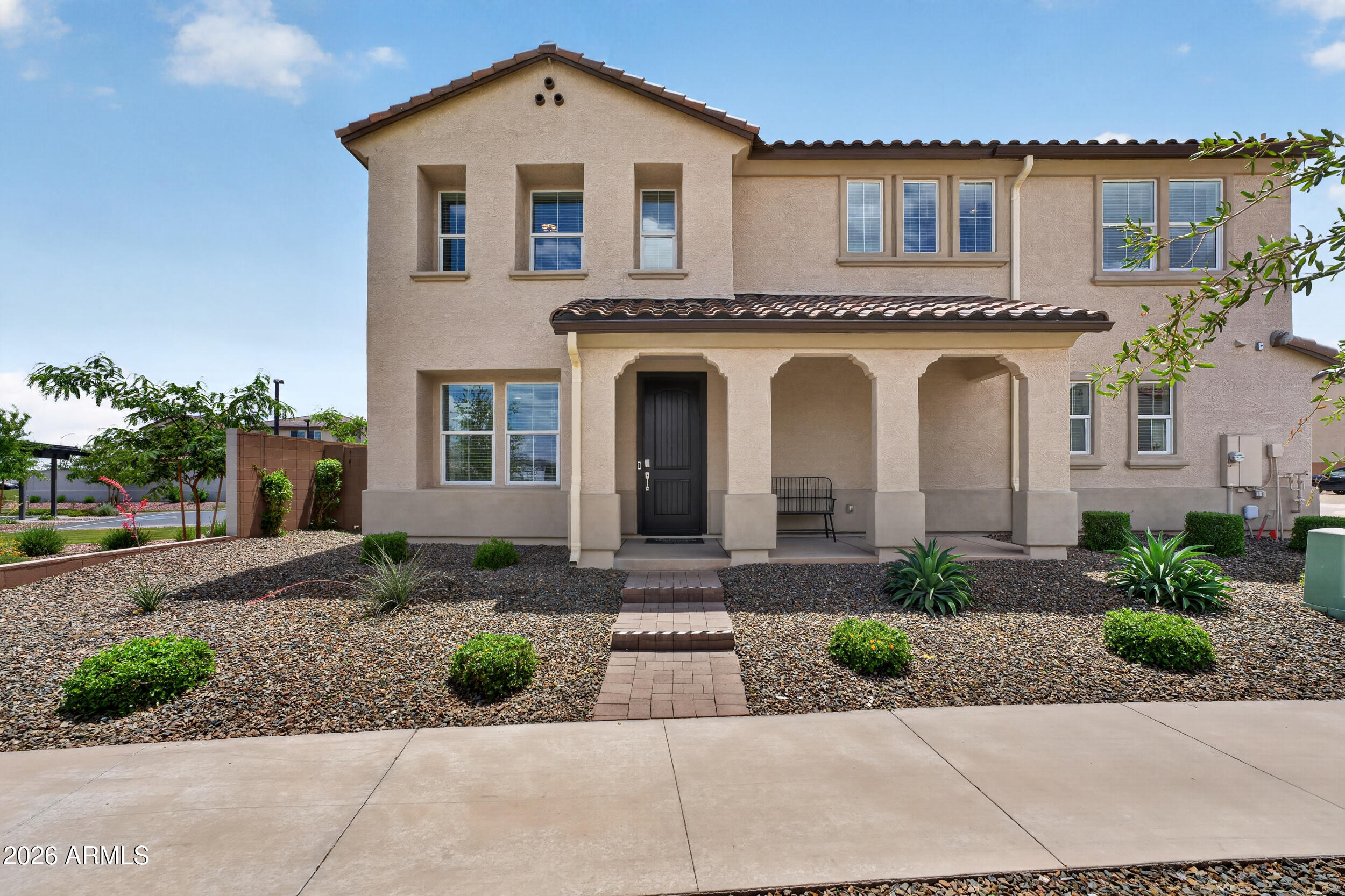 10207 E ULYSSES Avenue