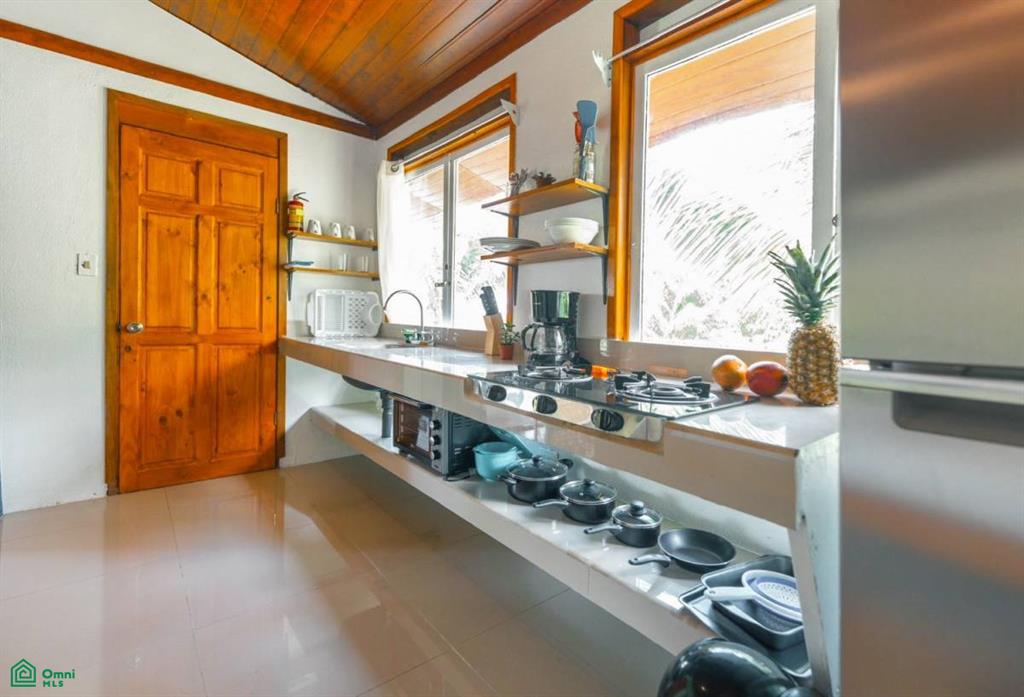 Turnkey 10-Bedroom Airbnb Investment with Pool & Commercial Potential in Ojochal , Puerto Cortés, Osa, Puntarenas