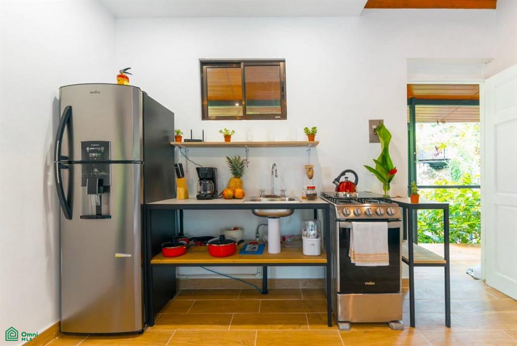 Turnkey 10-Bedroom Airbnb Investment with Pool & Commercial Potential in Ojochal , Puerto Cortés, Osa, Puntarenas