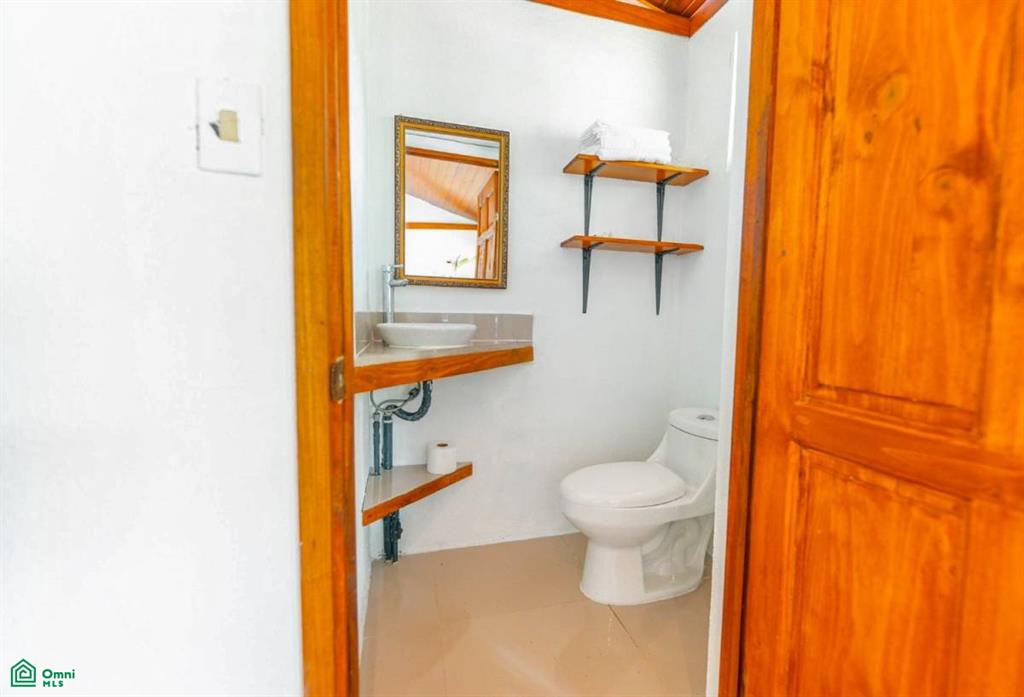 Turnkey 10-Bedroom Airbnb Investment with Pool & Commercial Potential in Ojochal , Puerto Cortés, Osa, Puntarenas