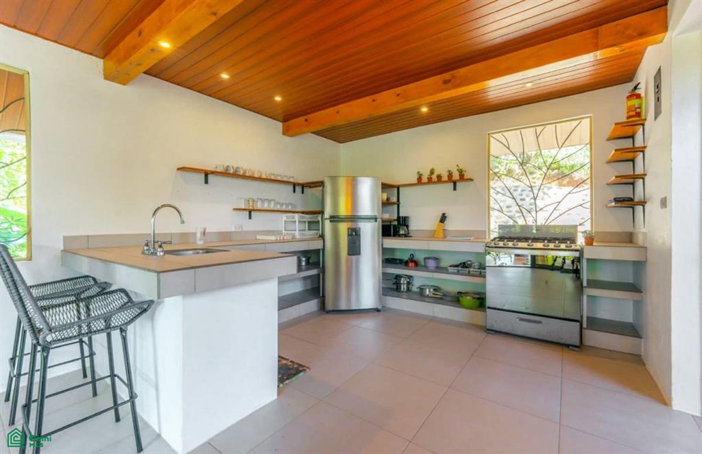 Turnkey 10-Bedroom Airbnb Investment with Pool & Commercial Potential in Ojochal , Puerto Cortés, Osa, Puntarenas