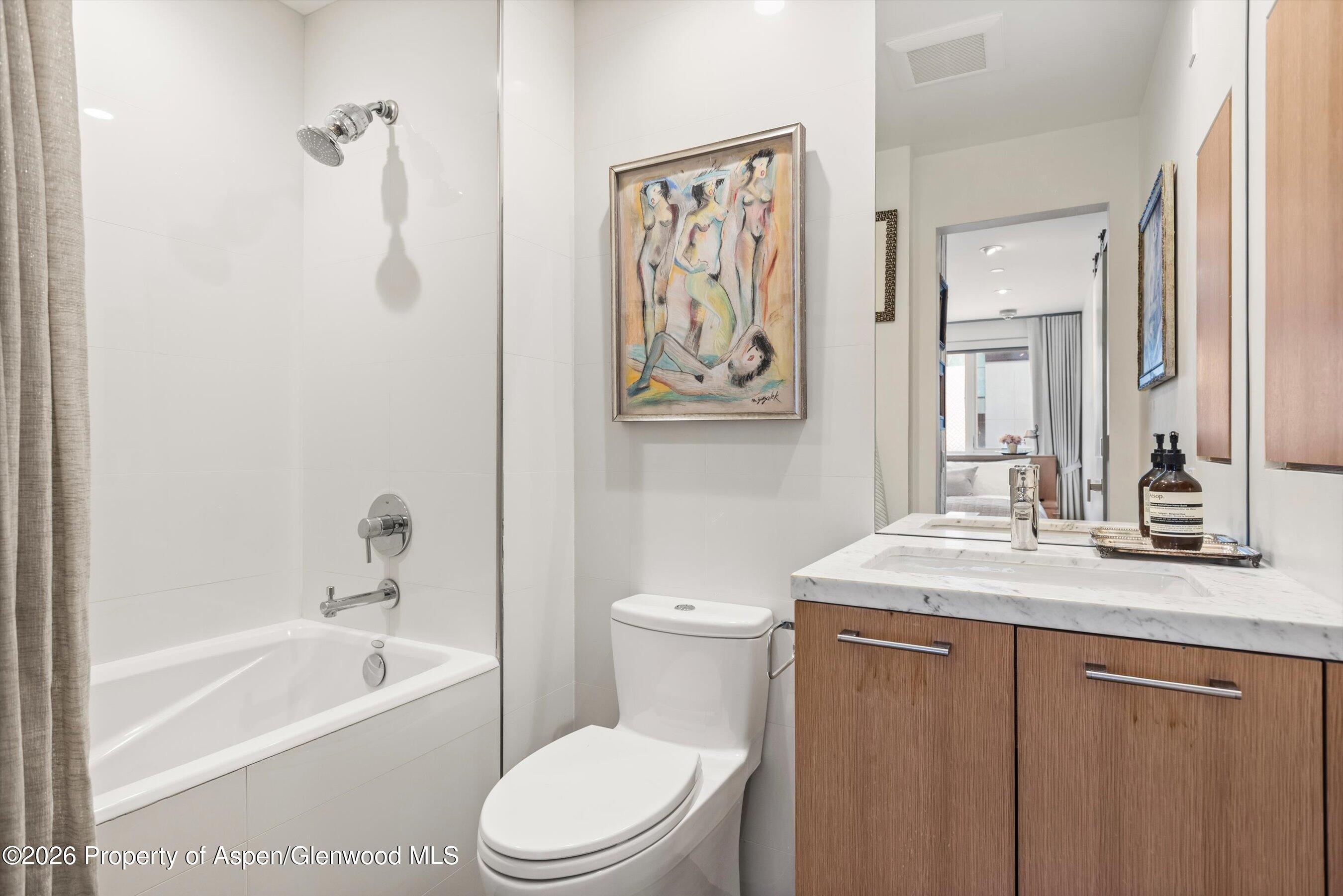 100 E Cooper Avenue 5