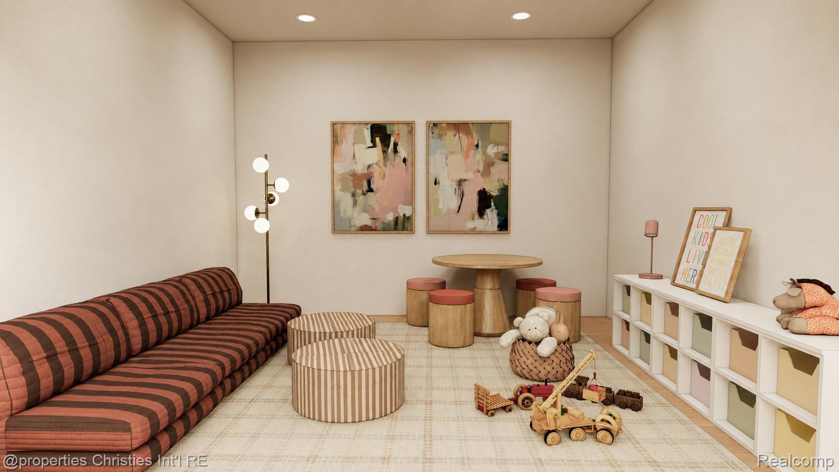 Children’s playroom with a striped sofa, wooden play table, toys, and built-in cubbies.