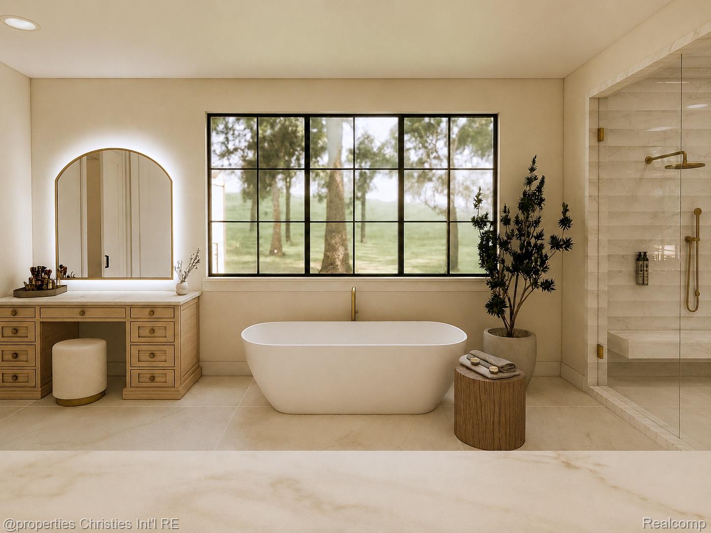 Bathroom with a freestanding tub beneath a large window, wood vanity, and marble shower.