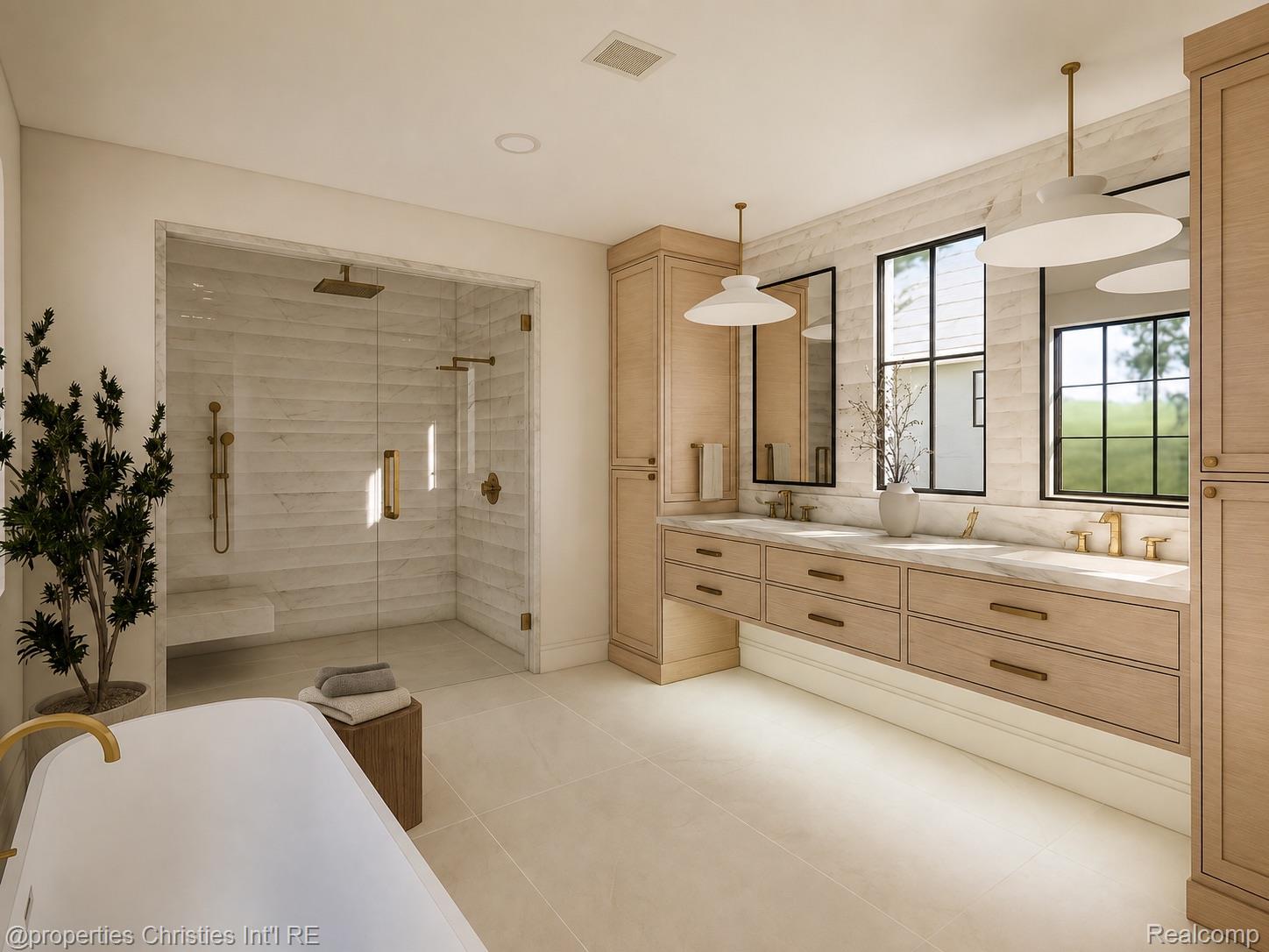 Contemporary bathroom with a light wood double vanity, marble-look shower, and freestanding soaking tub.