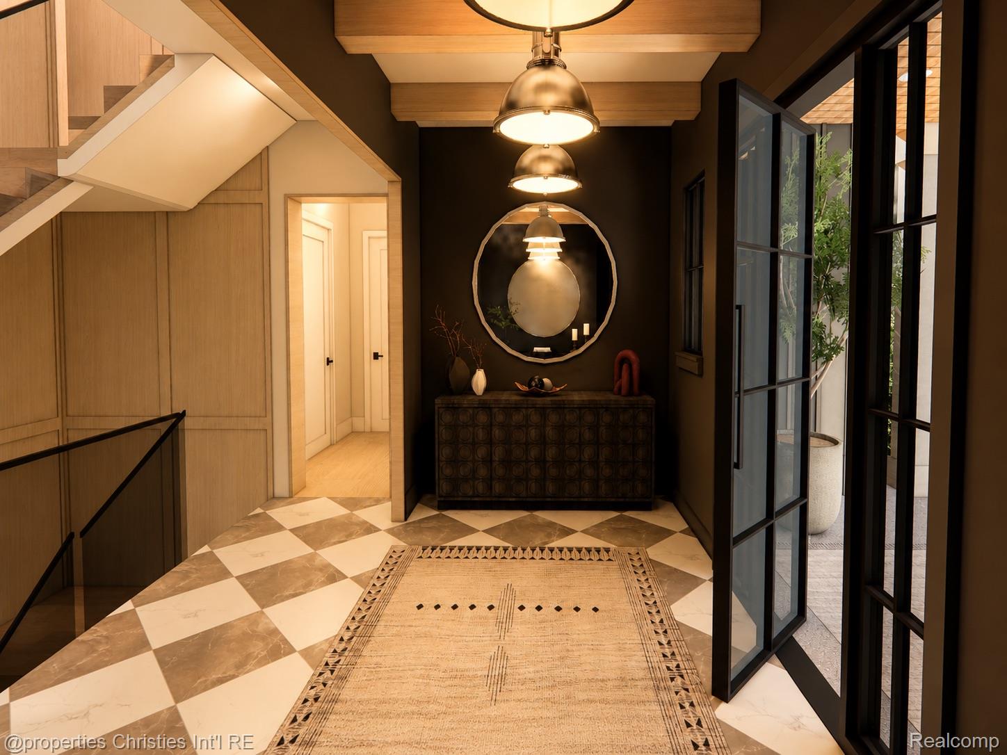 Entry foyer with a round mirror, black console, checkerboard marble floor, and glass doors to a patio.