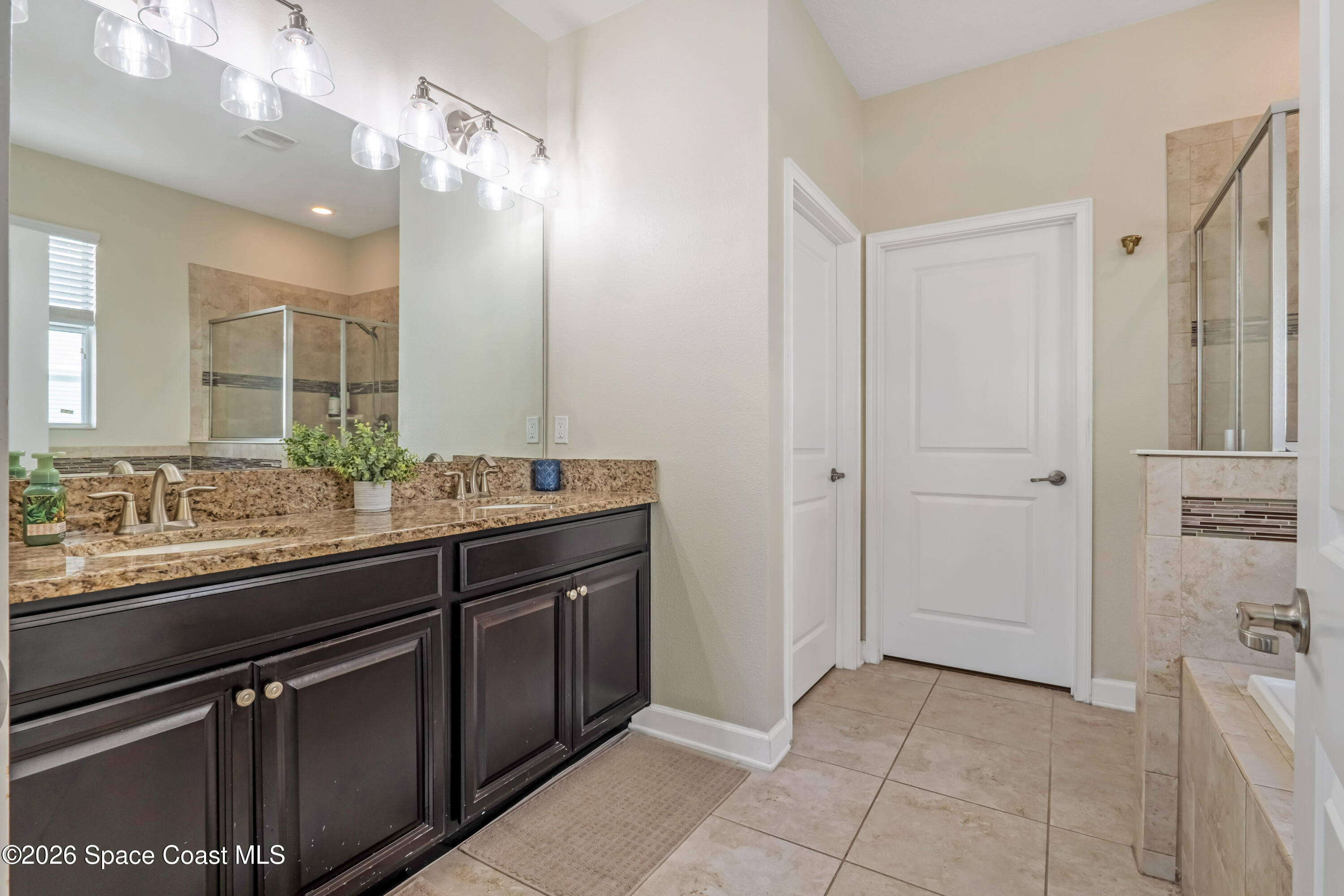 9923 Magnolia Woods Boulevard