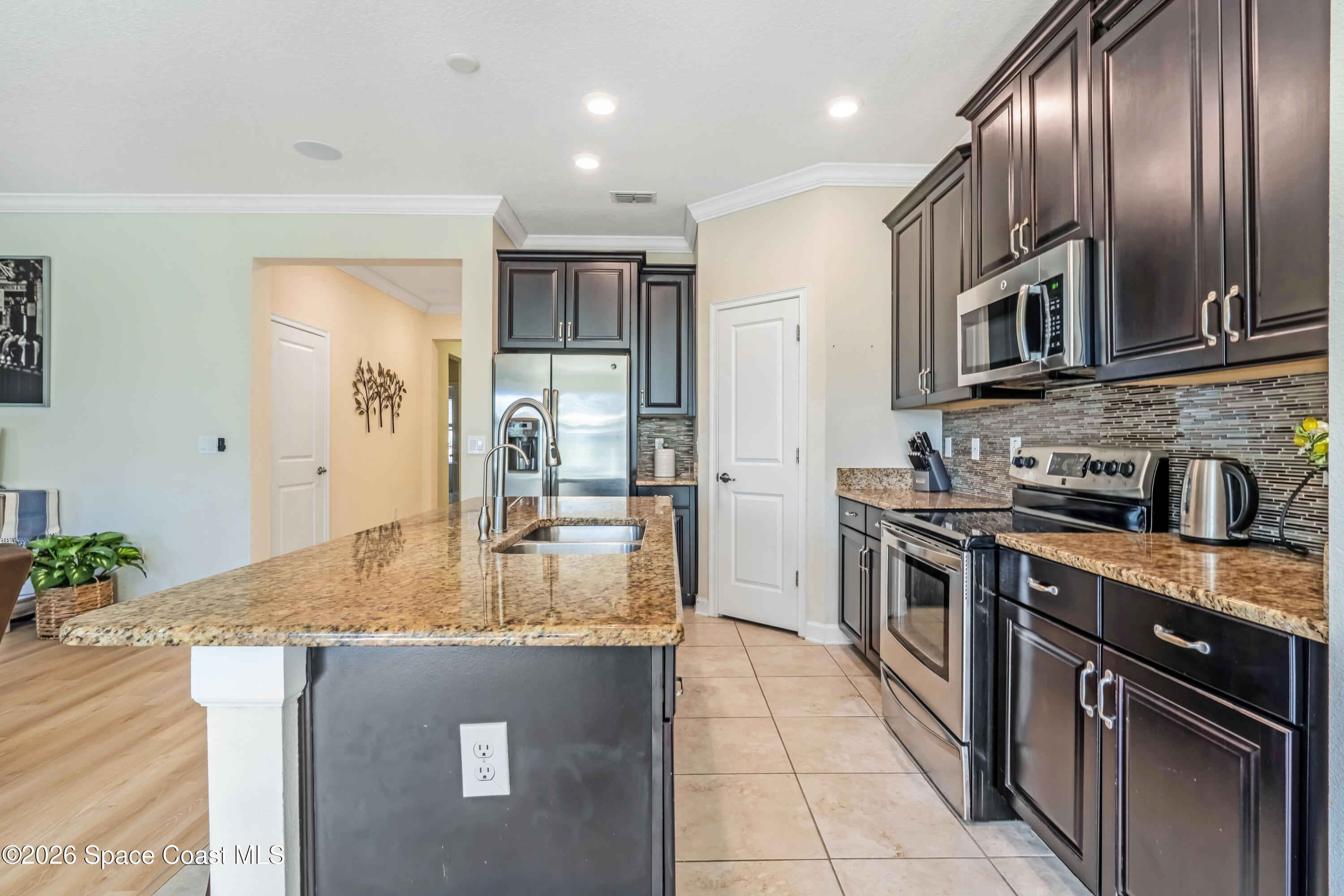 9923 Magnolia Woods Boulevard