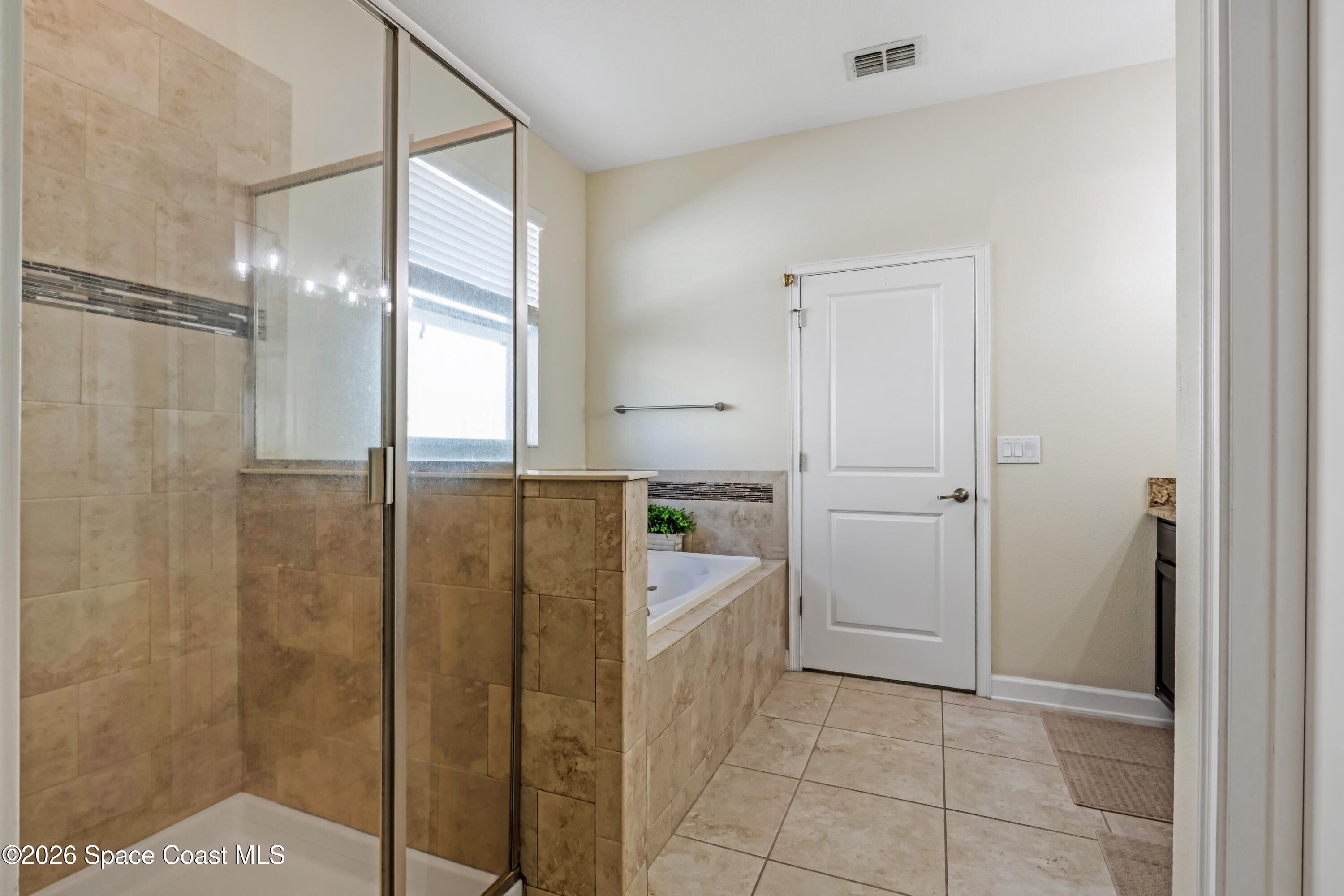 9923 Magnolia Woods Boulevard